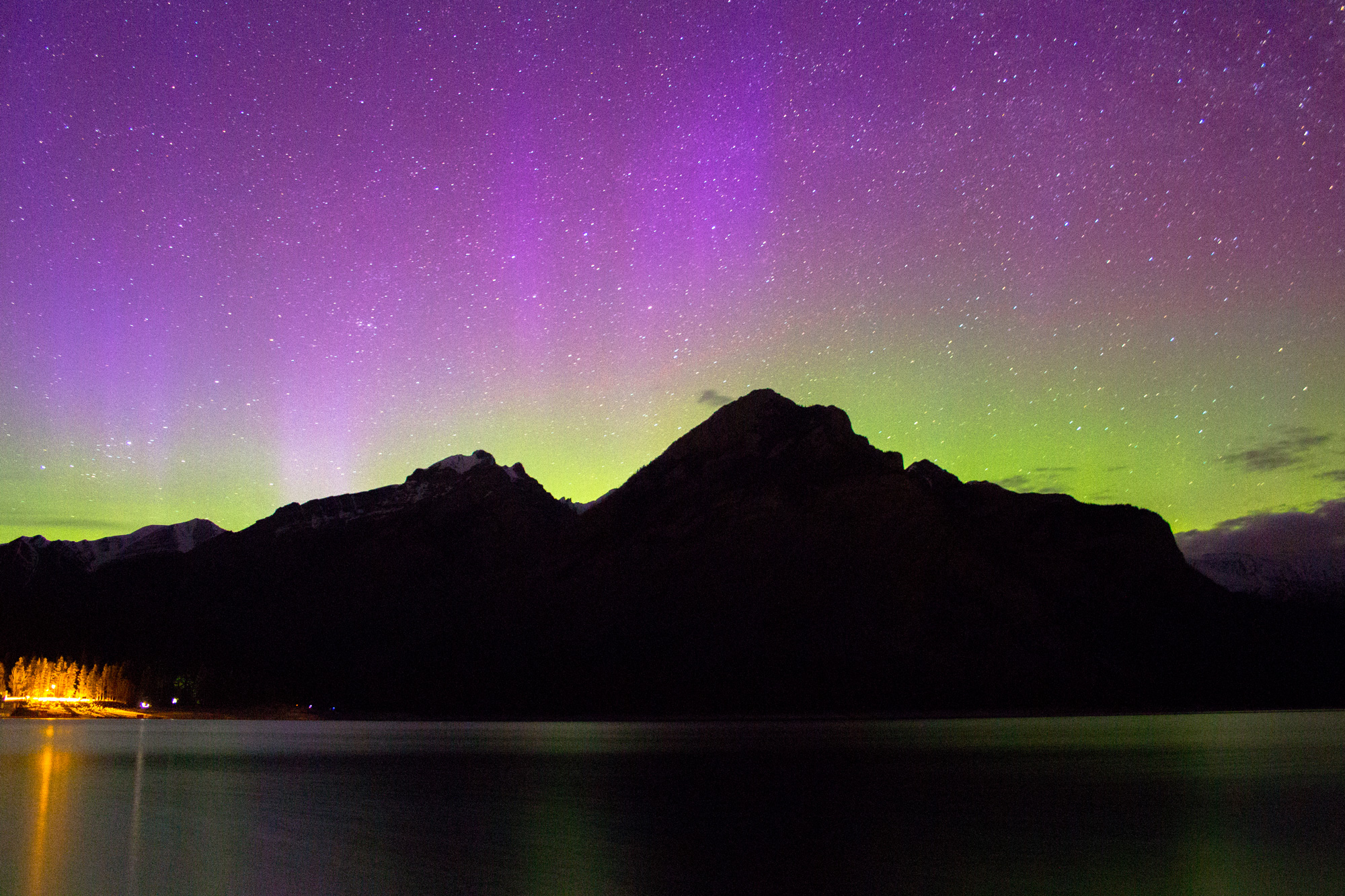 Catching the Northern Lights at Lake Minnewanka is one of the top things to do in Banff